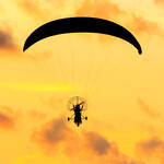 Backlit motorised paraglider